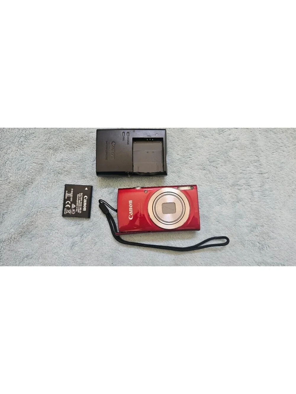 CANON POWER SHOT ELPH 180 IN RED 8X ZOOM Battery And Charger. No Memory Card.